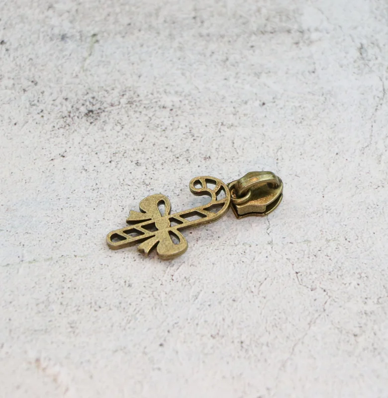 Sallie Tomato: Candy Cane Zipper Pull- Antique
