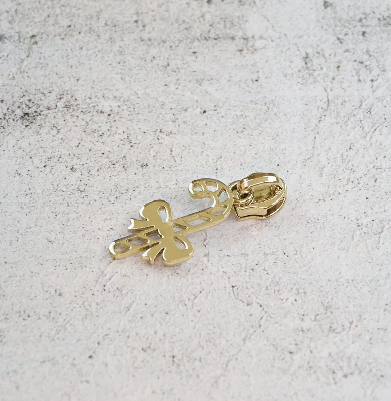 Sallie Tomato: Candy Cane Zipper Pull- Gold