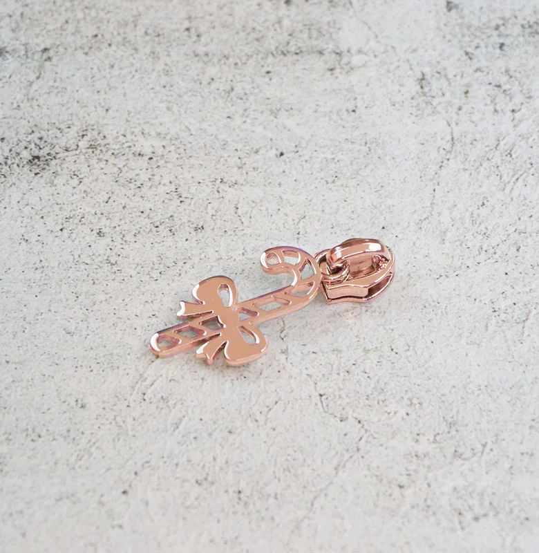 Sallie Tomato: Candy Cane Zipper Pull- Rose Gold