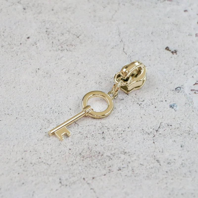 Sallie Tomato: Key Zipper Pull-Gold